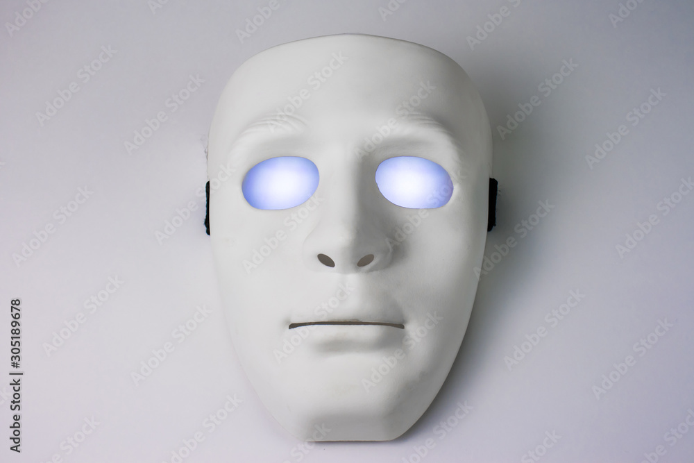 White mask with glowing eyes White mask with glowing eyes
