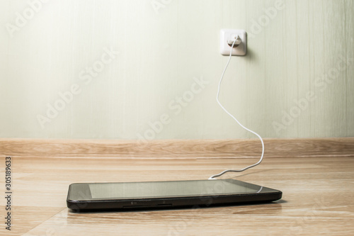 Charging tablet from the  power outlet