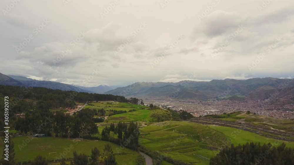 Aerial top view of the inca ruins of Sacsayhuaman on the outskirts of Cusco, Peru. Archaeological site of ancient Incan citadel. Aerial top view of the inca ruins of Sacsayhuaman on the outskirts of Cusco, Peru. Archaeological site of ancient Incan citadel.