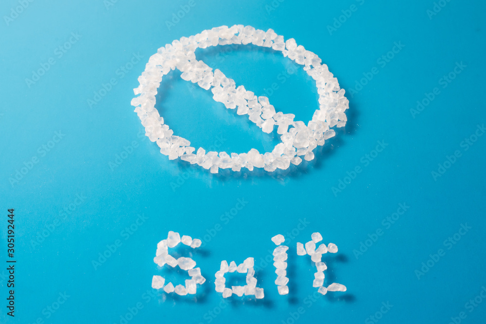 Word and sign consists of sea salt crystals, the concept of harm to health