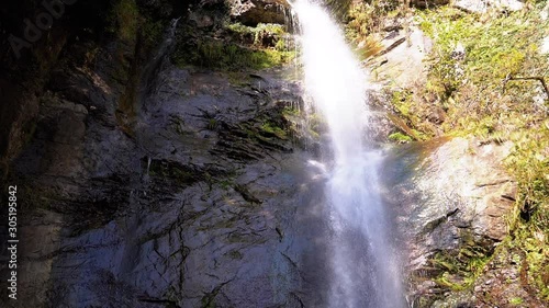 Makhuntseti Waterfall in Autumn. Falling Water Hitting on the Rocks. Slow Motion. photo