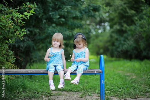 Mom with two daughters twins © alexkich