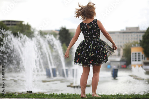 Beautiful girl in the summer park