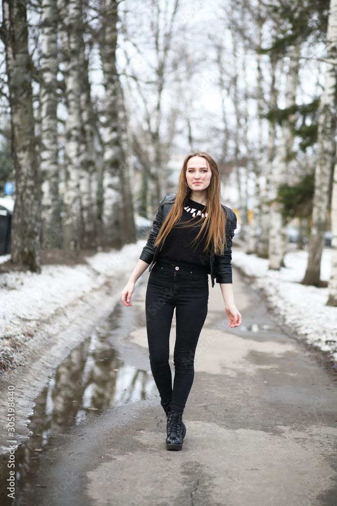 Young cute girl on a walk in the city Young cute girl on a walk in the city