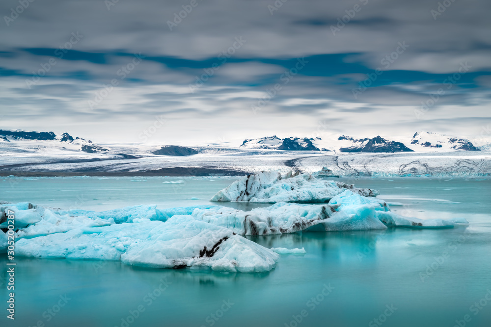 Icebergs float on Jokulsarlon glacier lagoon.