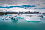 Floating icebergs in Jokulsarlon glacier lagoon.