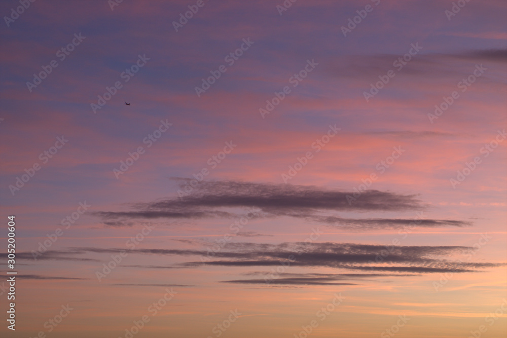 jet in the sky,cloud,sunset,cloudscape,beautiful,pink,atmosphere, color