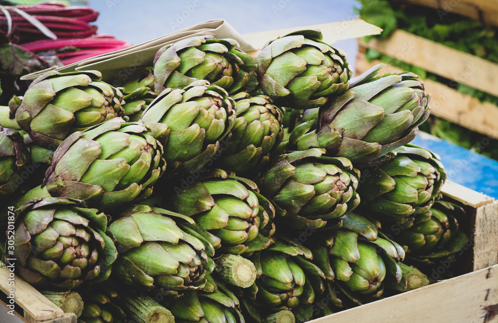 Close up of Artichokes on display on a market Close up of Artichokes on display on a market