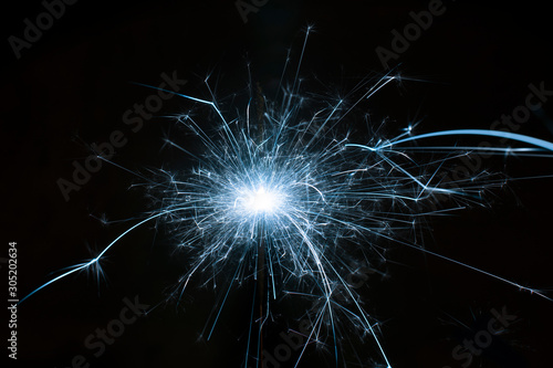 Wallpaper Mural Burning sparkler on black background Torontodigital.ca