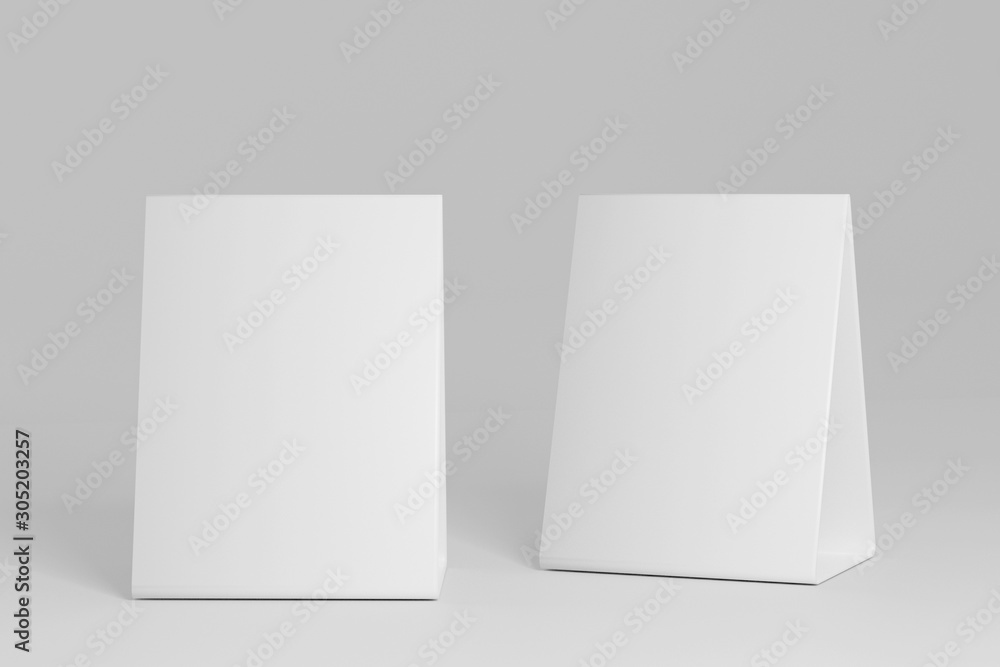 Mockup two white blank paper table card 3d illustration isolated on white background with clipping path, table tent blank, Stand for booklets with white sheets of paper. Mockup two white blank paper table card 3d illustration isolated on white background with clipping path, table tent blank, Stand for booklets with white sheets of paper.