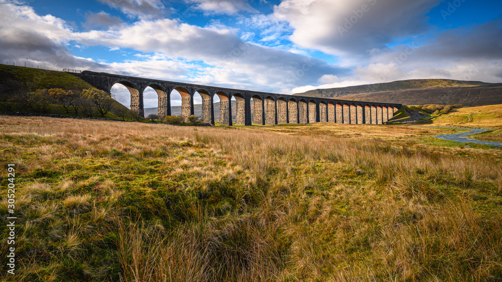 Railway Viaduct at Ribblehead, which carries the Settle to Carlisle Railway across Batty Moss spanning 400 m and 32 m above the valley floor