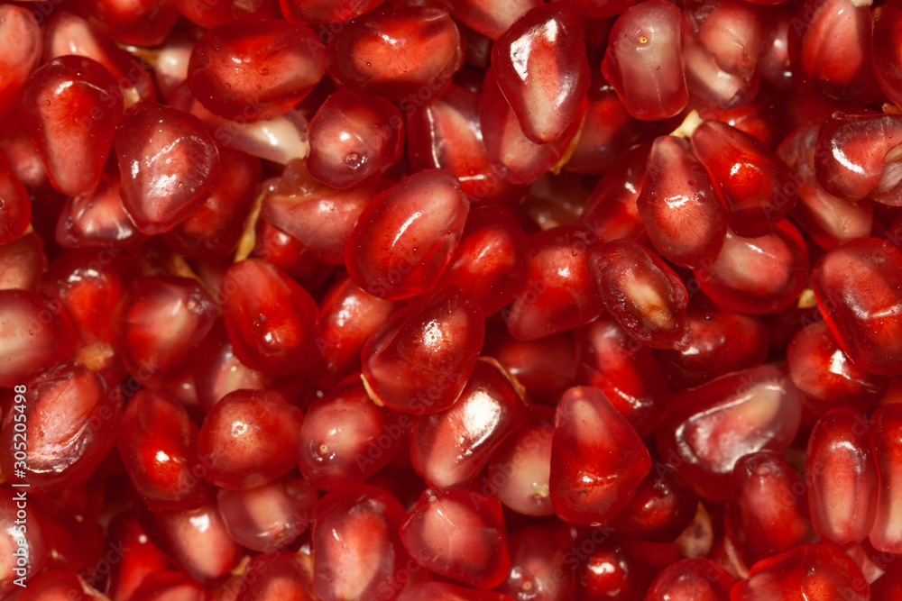 Garnet little seeds red macro for background above view Garnet little seeds red macro for background above view
