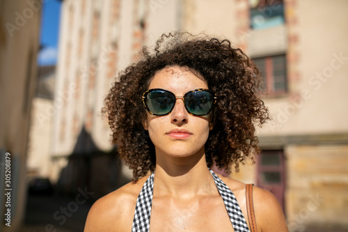 young beautiful woman in the street 