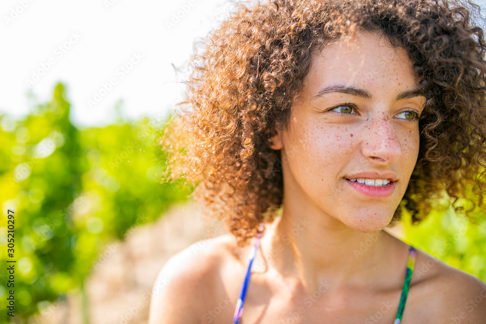 a woman in a vineyard a woman in a vineyard