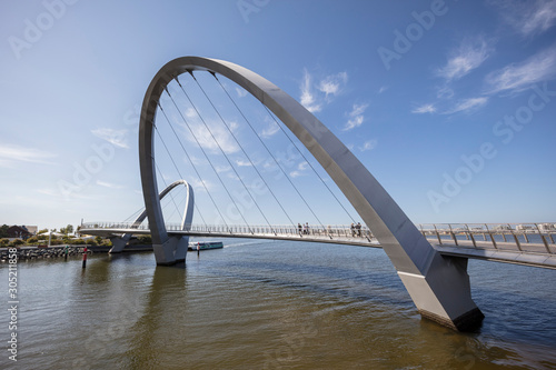 Fototapeta Naklejka Na Ścianę i Meble -  View of the iconic curved pedestrain bridge at Elizabeth Quay in Perth, Western Australia
