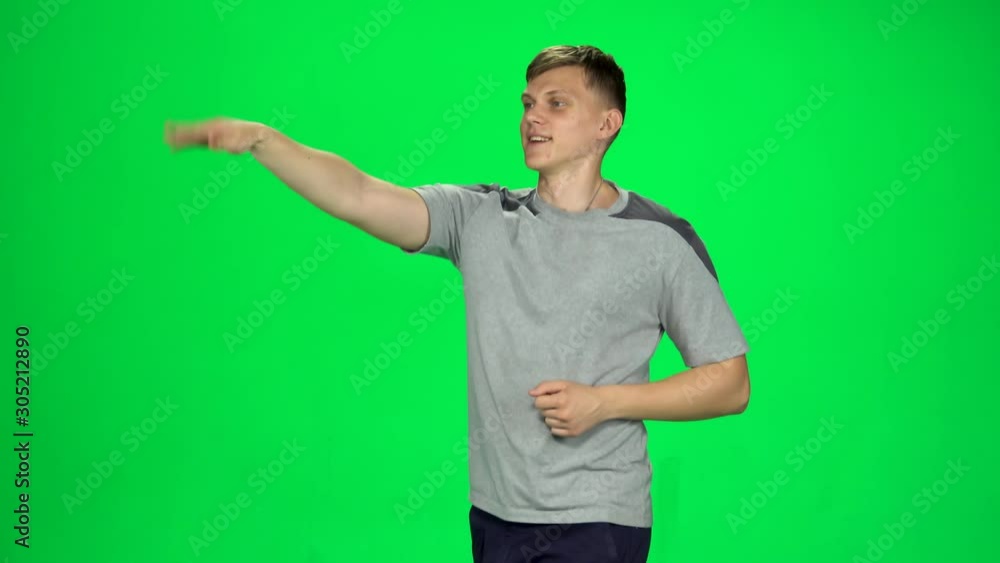Guy runs and waves his hand stand, Chroma Key Guy runs and waves his hand stand, Chroma Key