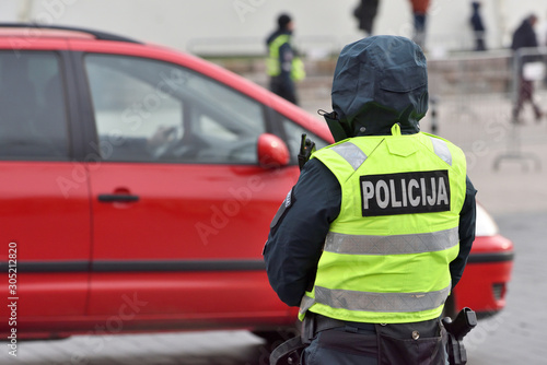 Police officer managing road traffic