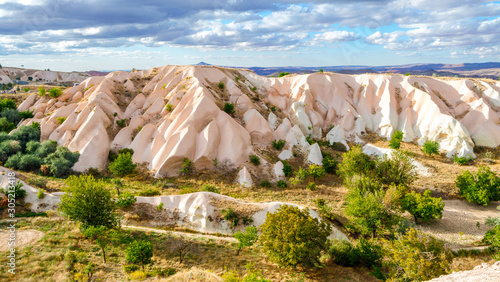 Mountain landscape in Pigeon valley in Cappadocia, Turkey. Unreal rock formations of Cappadocia