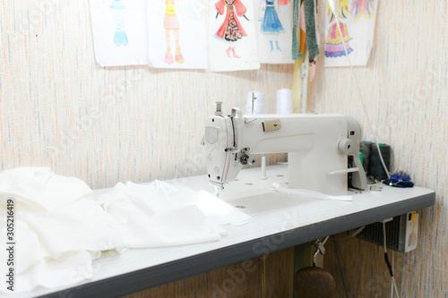 seamstress sewing workshop thread fabric