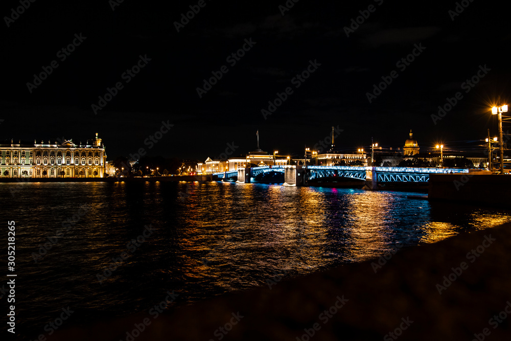 Fototapeta premium bridge at night lights reflected in the river
