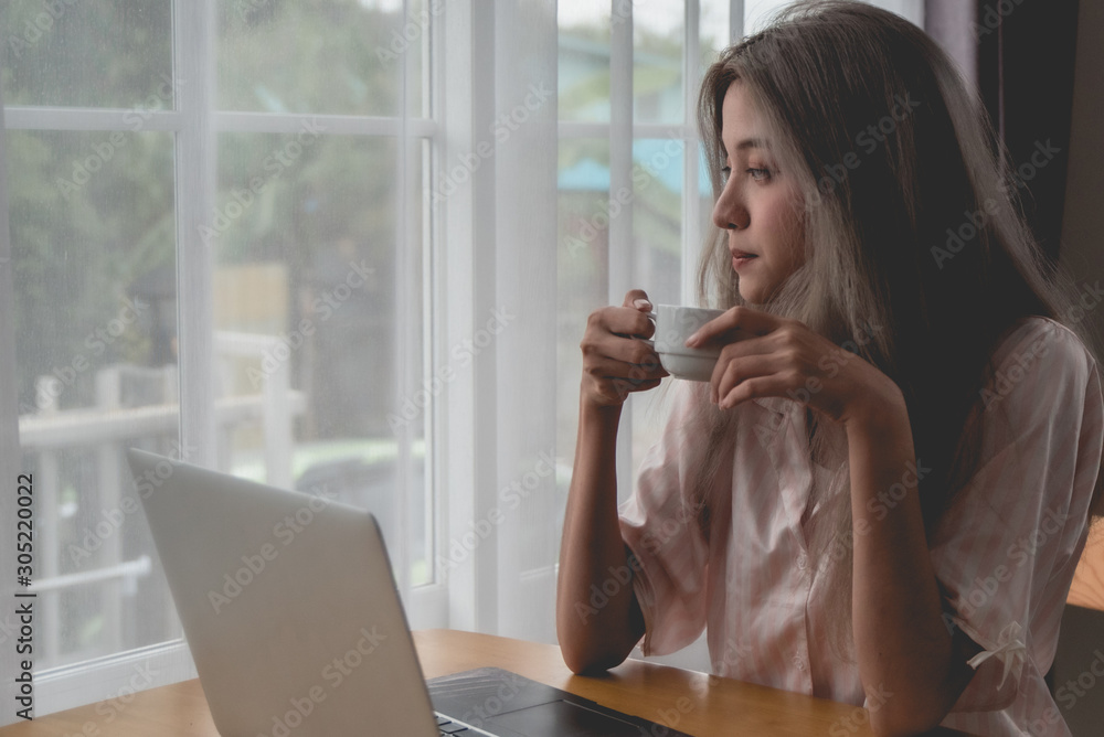 Lazy woman drinking morning coffee at home. Lazy woman drinking morning coffee at home.