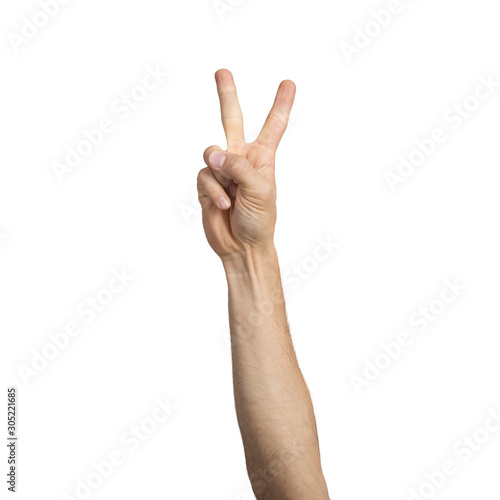 Adult man hand showing victory gesture