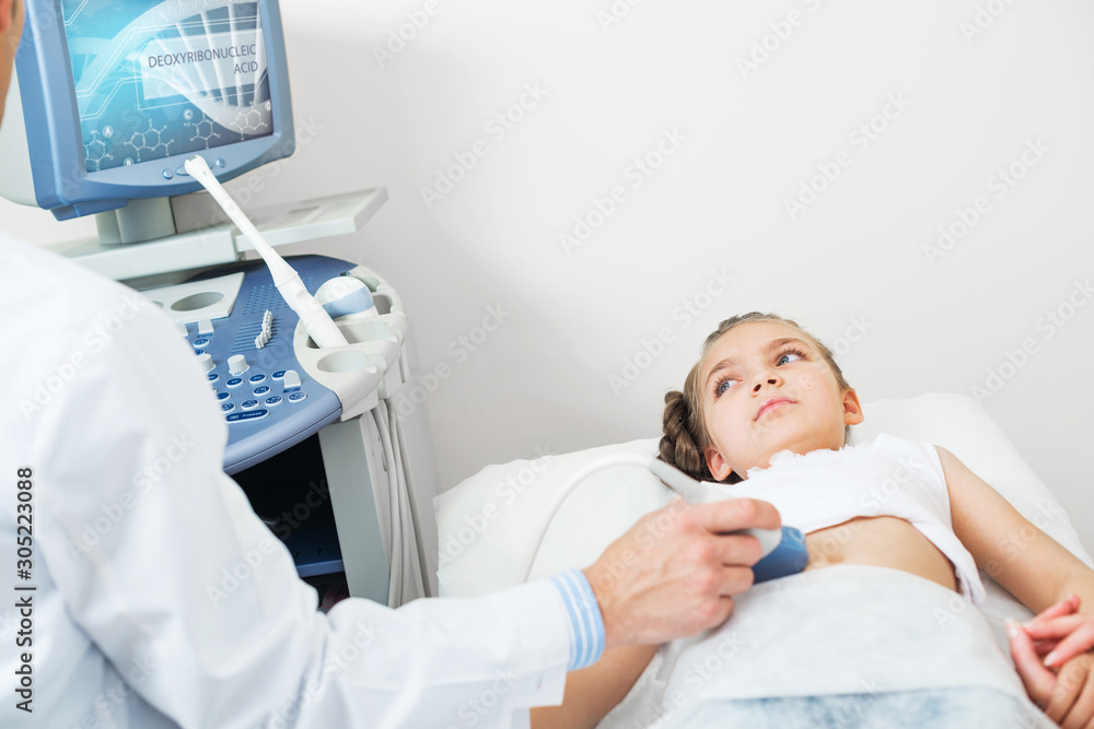 Medical procedure of smiling little girl Medical procedure of smiling little girl