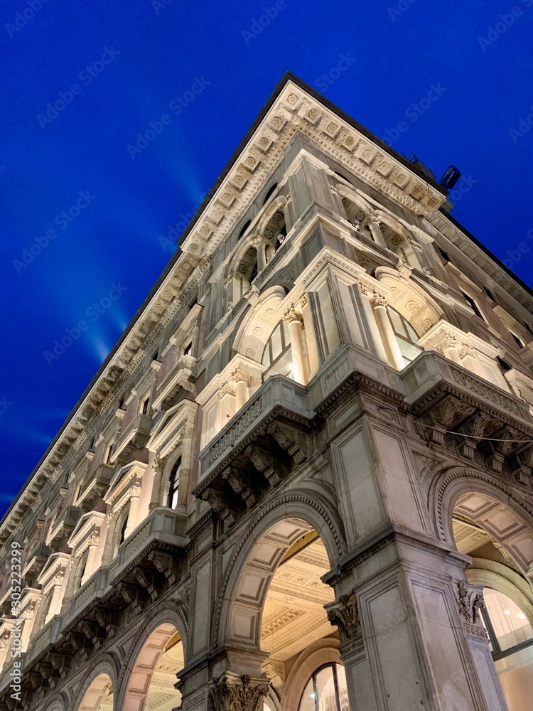 Italian architecture. Corner of a building against the twilight sky. 