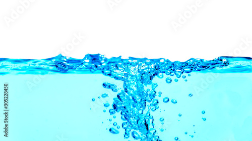 Close up wave blue Water splash with air bubbles on white background for effect and wallpaper.
