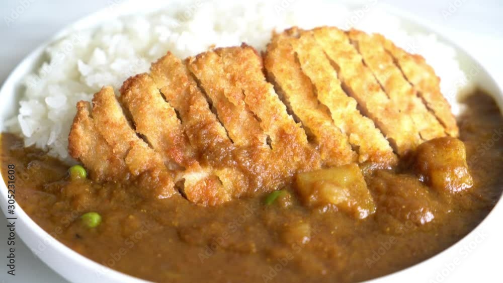 fried cutlet pork with curry on rice fried cutlet pork with curry on rice