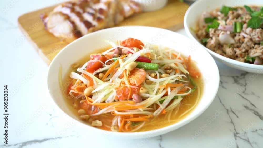 spicy papaya salad (Traditional Thai food) spicy papaya salad (Traditional Thai food)