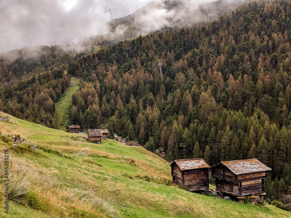 Alpine wooden houses in the Swiss Alps.
