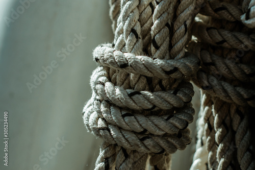 Strong wound rope. White twisted anchor halyard