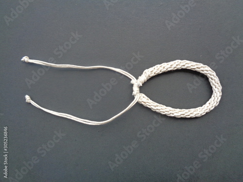 kumihimo rope bracelet with white and red color