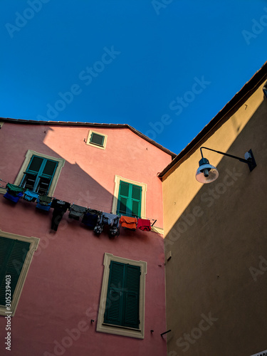 Close-up of an old exterior building with washing lines