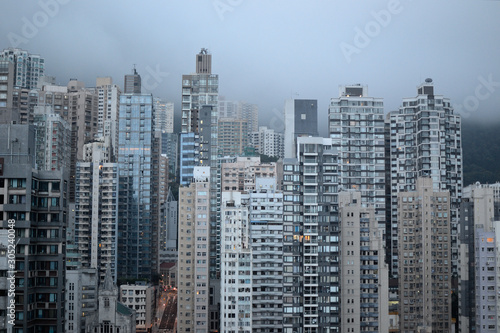 Hong Kong skyscrapers city view from rooftop © Olga Loko