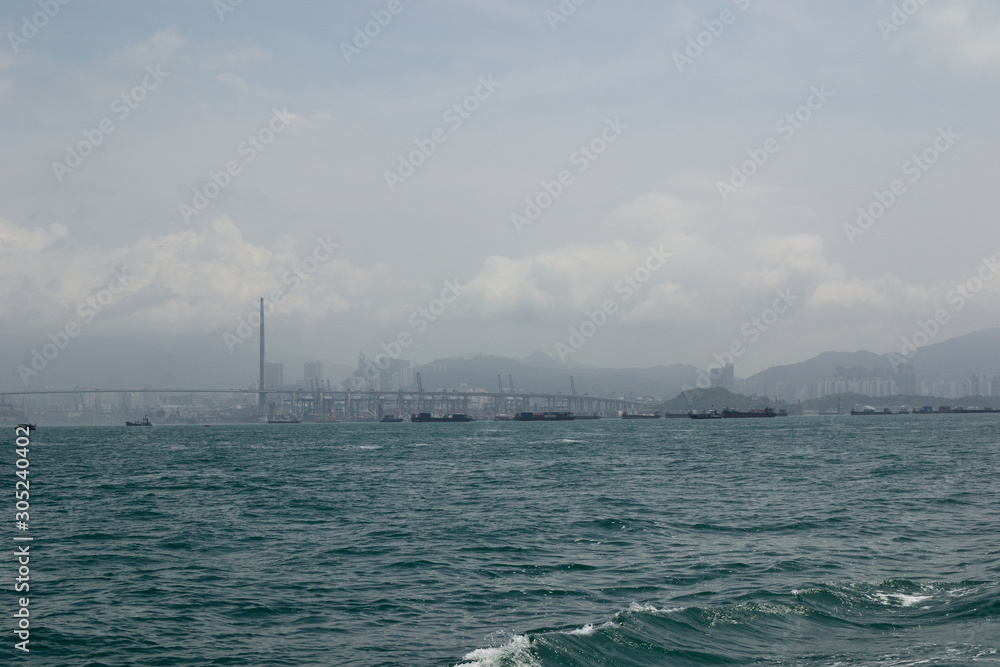 Hong Kong skyscrapers city view from the sea