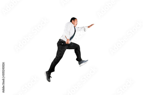 Businessman leaping forward isolated over white background