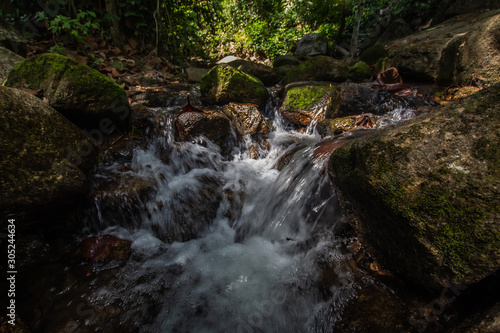 Kathu Waterfall in the tropical forest area In Asia  suitable for walks  nature walks and hiking  adventure photography Of the national park Phuket Thailand Suitable for travel and leisure.