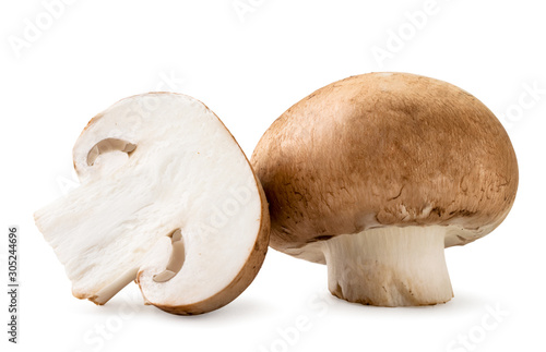 Fresh mushrooms and half closeup on a white. Isolated