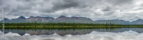 Alaska pine tree forest reflection on a lake 32:9 ultrawide