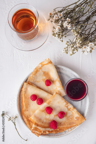 Tasty pancakes with fresh raspberrie. Breakfast  concept. Top view photo