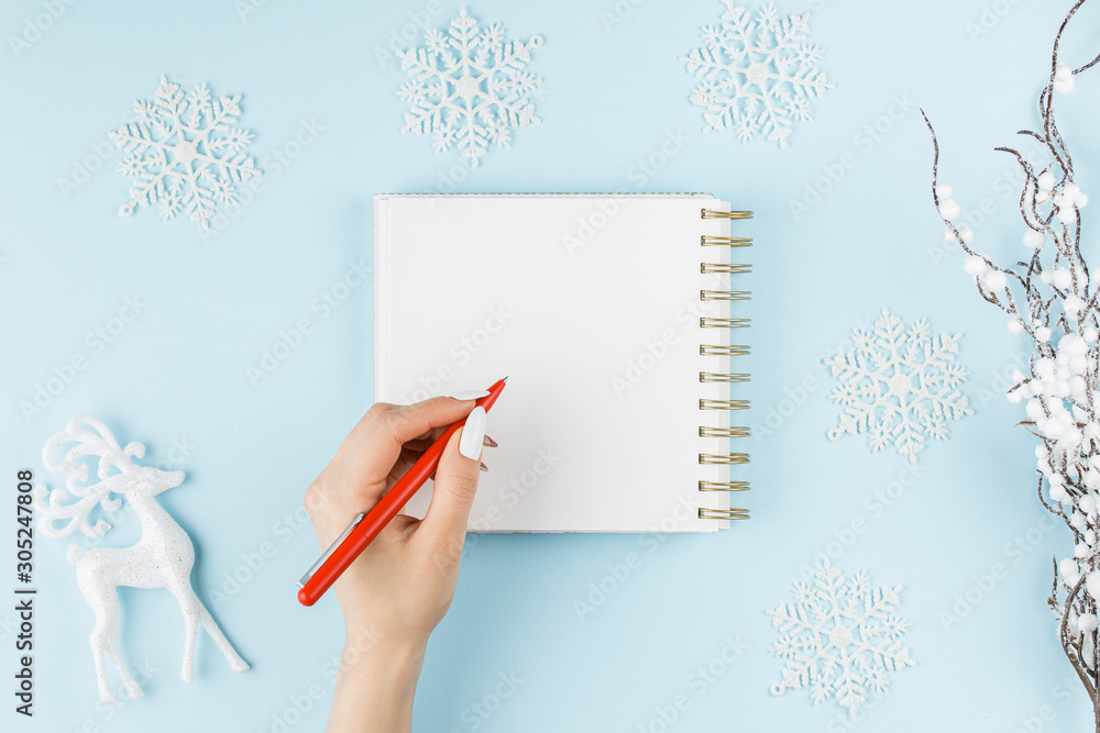 white notebook on a blue background white notebook on a blue background