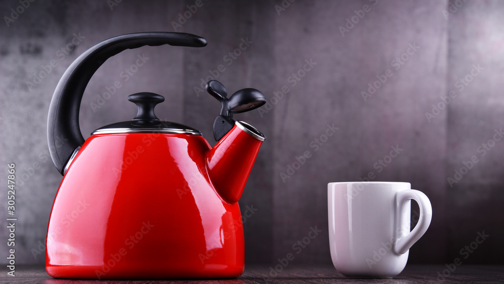 Traditional stainless steel stovetop kettle with whistle Traditional stainless steel stovetop kettle with whistle