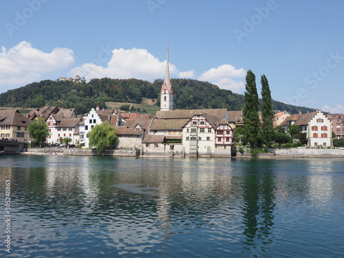 Marvelous St. George's Abbey at Rhine River at cityscape landscape of european STEIN am RHEIN town in SWITZERLAND 2018 photo