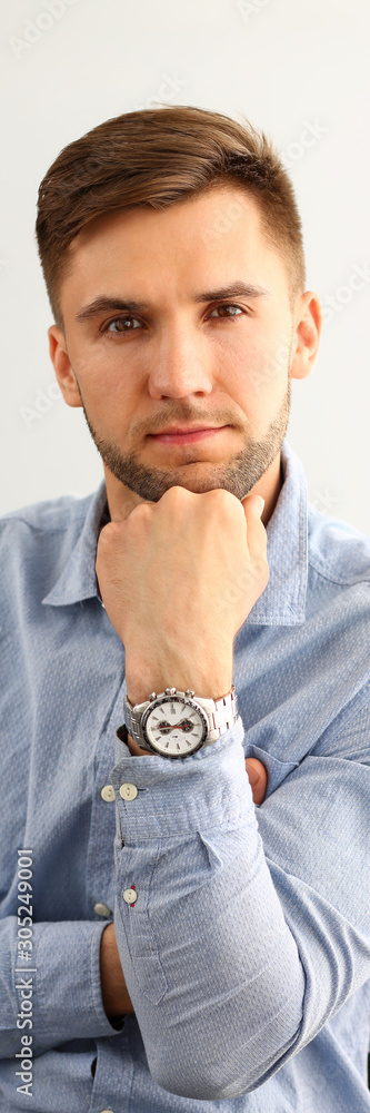 Portrait of smart man looking at camera with Portrait of smart man looking at camera with