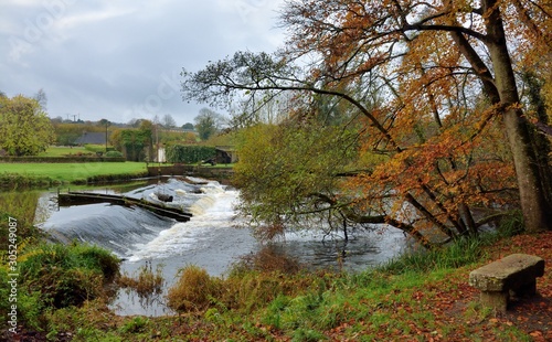 river and wallfall in autumn