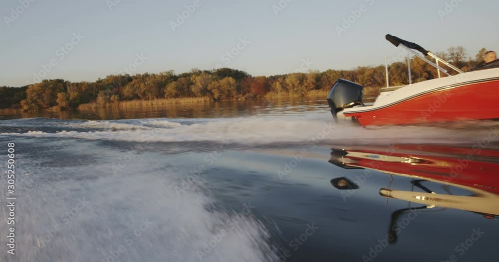Man driving a speedboat