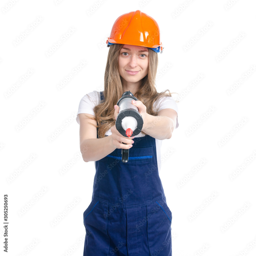 Woman builder with work helmet holding glue gun on white background  isolation Stock Photo | Adobe Stock