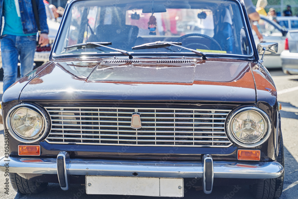 RUSSIA, BRYANSK - JULE, 2019: Russian Ussr retro car at an auto show. VAZ 2101 RUSSIA, BRYANSK - JULE, 2019: Russian Ussr retro car at an auto show. VAZ 2101